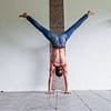 This is my Author Photo showing me doing a straddled Wall Handstand.